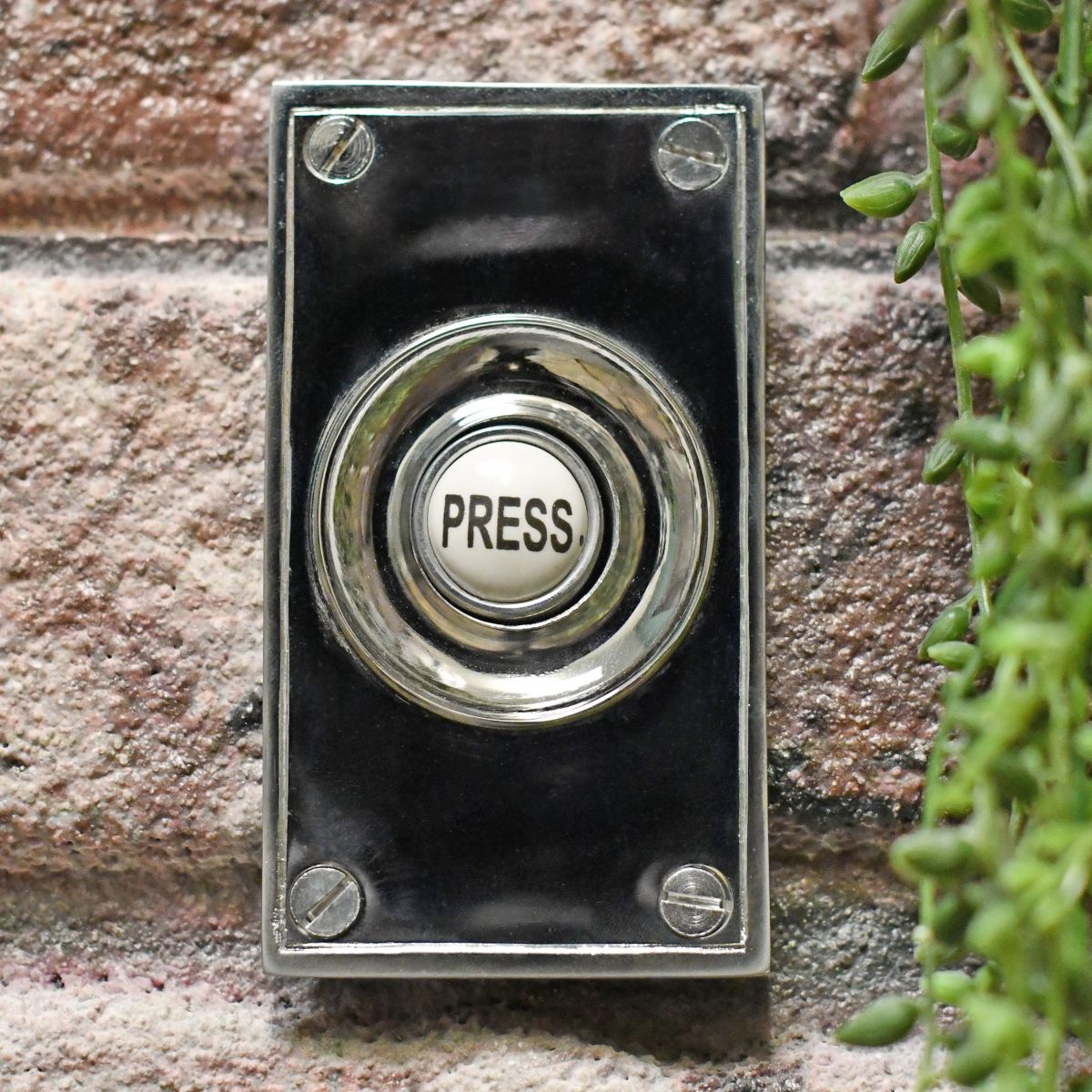 Simplistic simple door bell push finished in bright chrome Simplistic simple door bell push finished in bright chrome