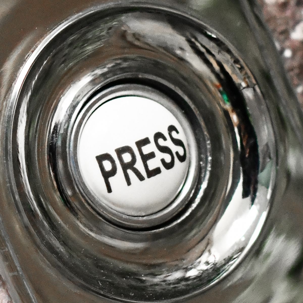 Close up of ceramic door press button Close up of ceramic door press button