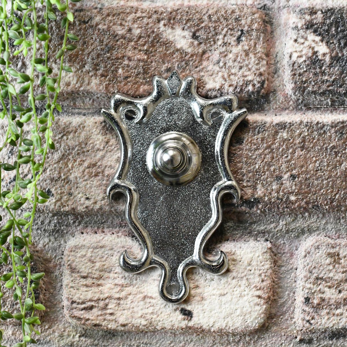 Chrome apartment door bell