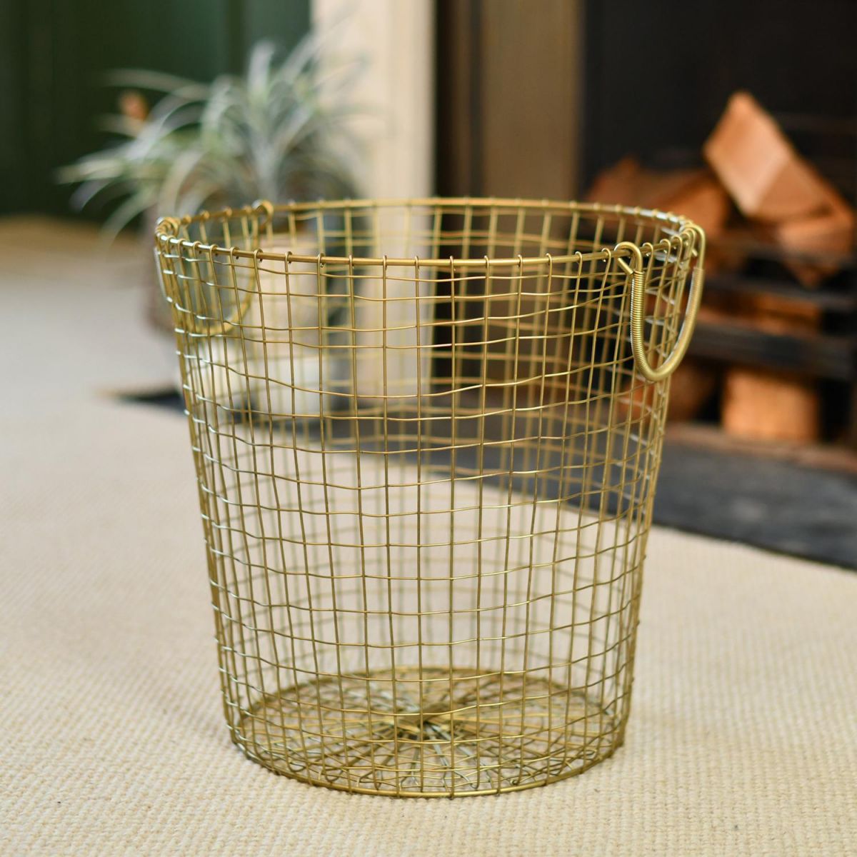 Brass Plated Wire Log Basket in Situ