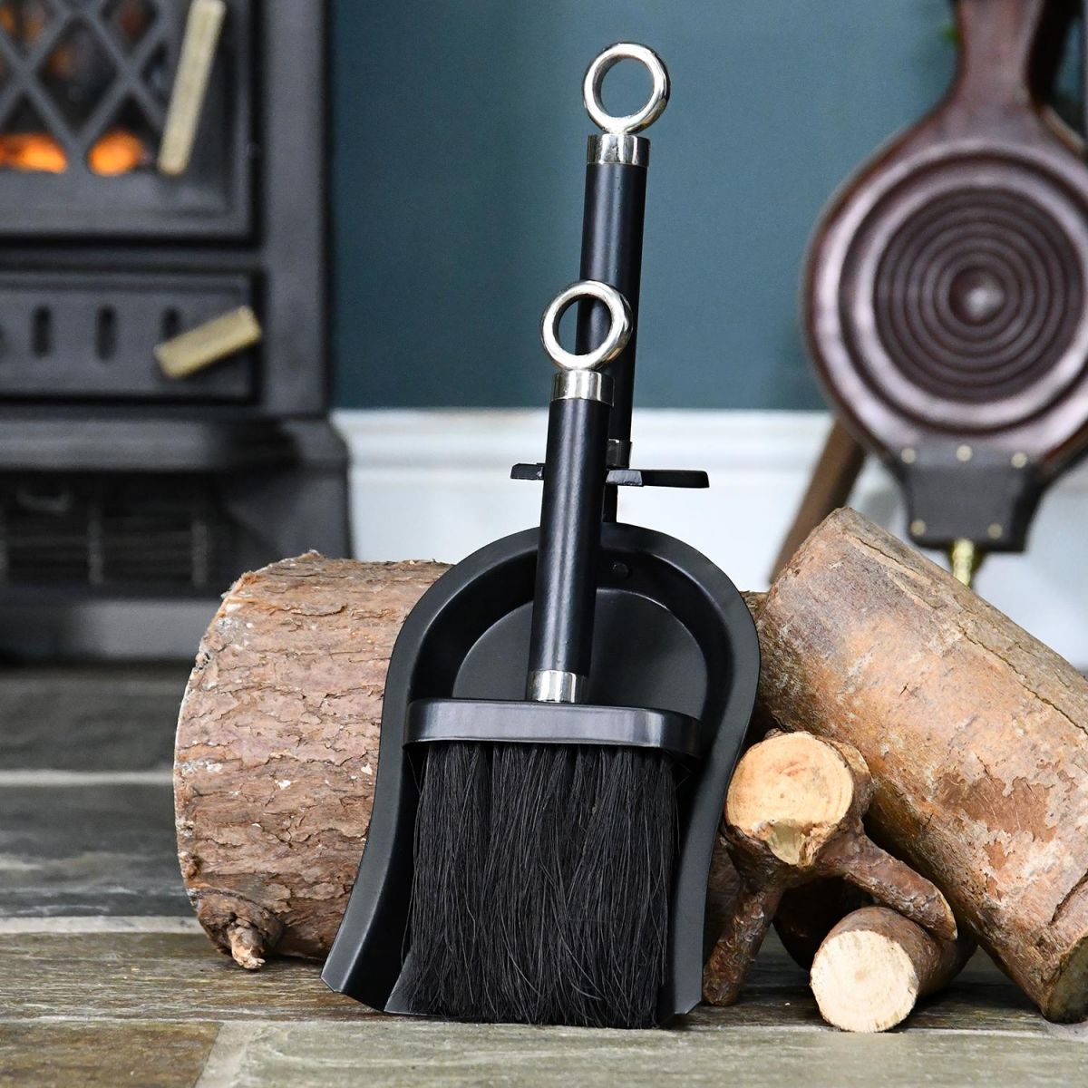Bright Chrome and Black Iron Shovel and Brush in Situ by the Fire Place Bright Chrome and Black Iron Shovel and Brush in Situ by the Fire Place