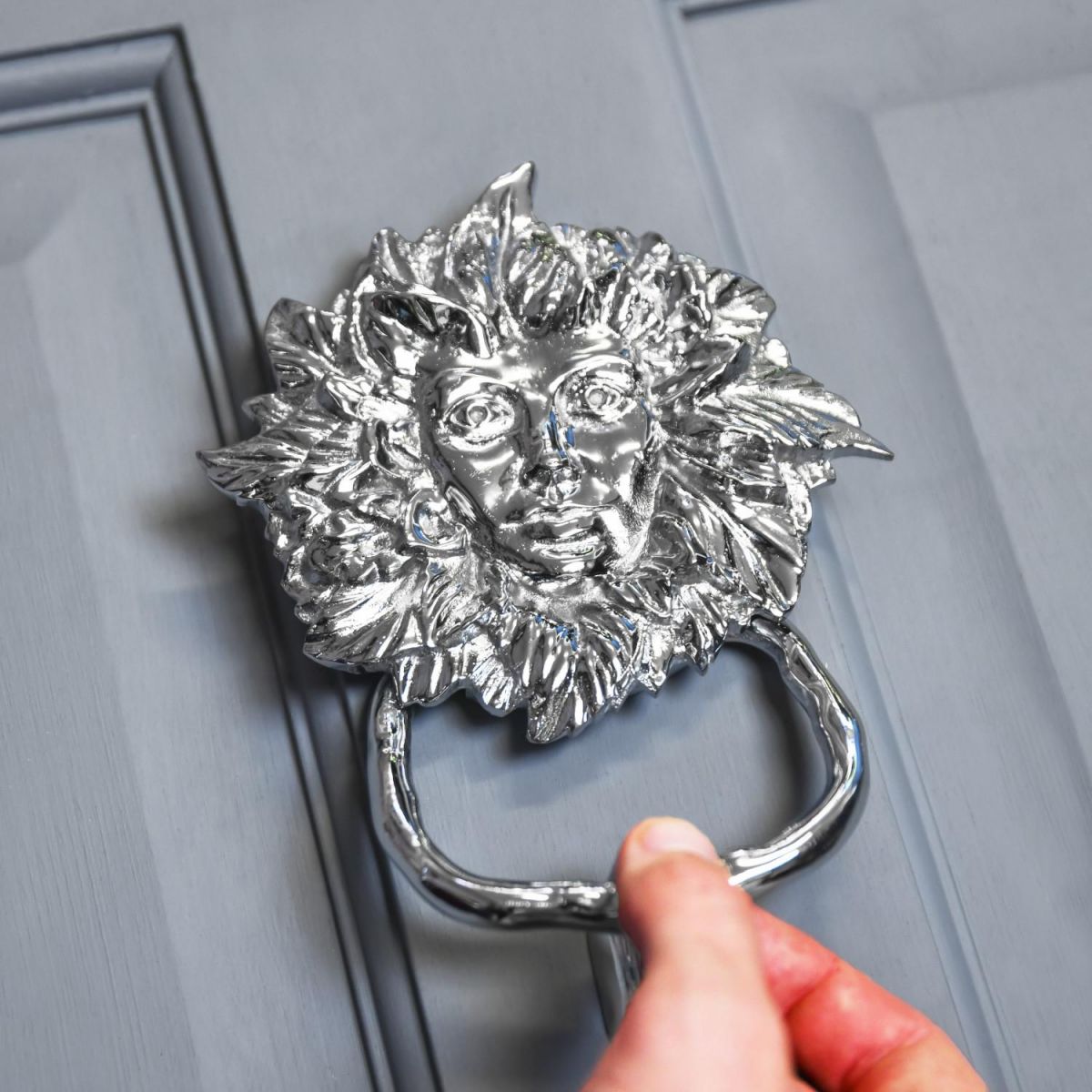 Bright Chrome Green Maiden Door Knocker in Use