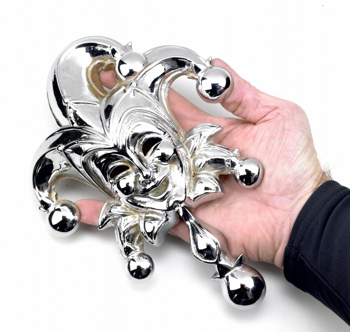Bright Chrome Jester door knocker in hand