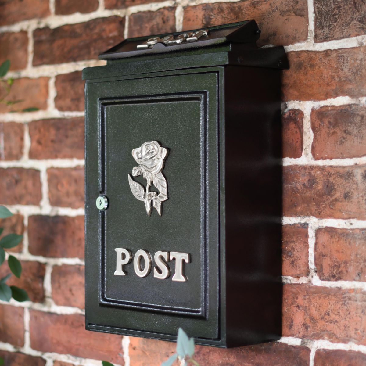 Bright Chrome Rose Post box on wall