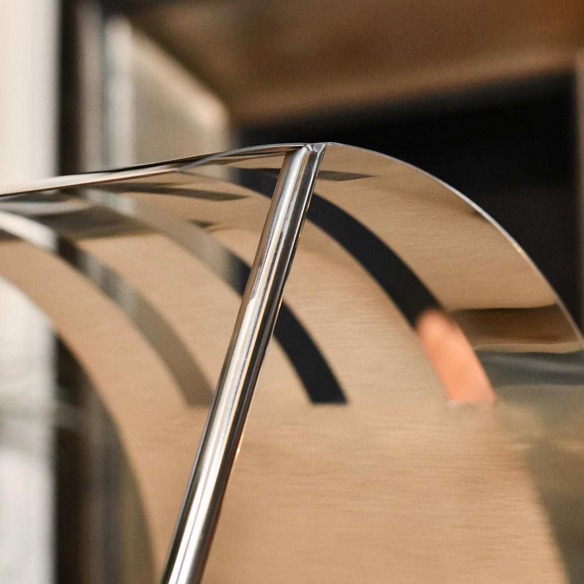 Close-up of the Bright Chrome Finish on the Moon Log Holder