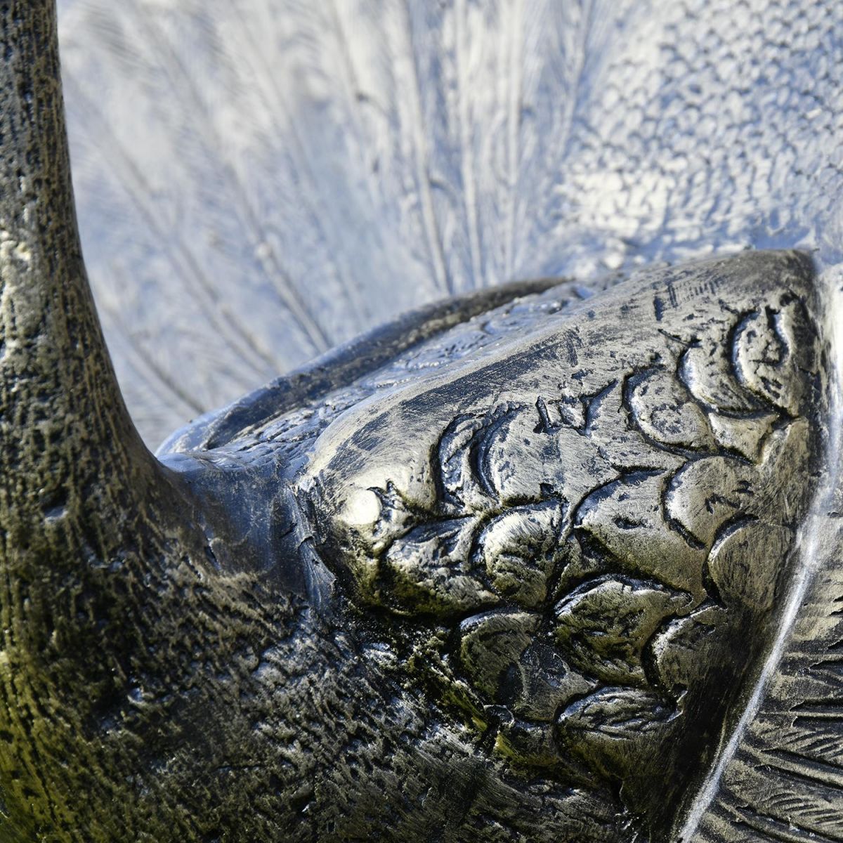 Close-up of the Bronze Finish on the Peacock Sculpture with Open Tail 