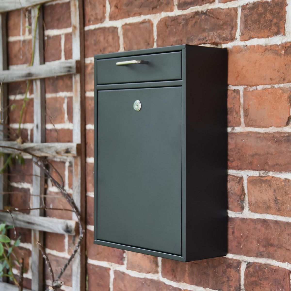 "Brookville" Black Wall Mounted Post Box in Situ on the Front of a House