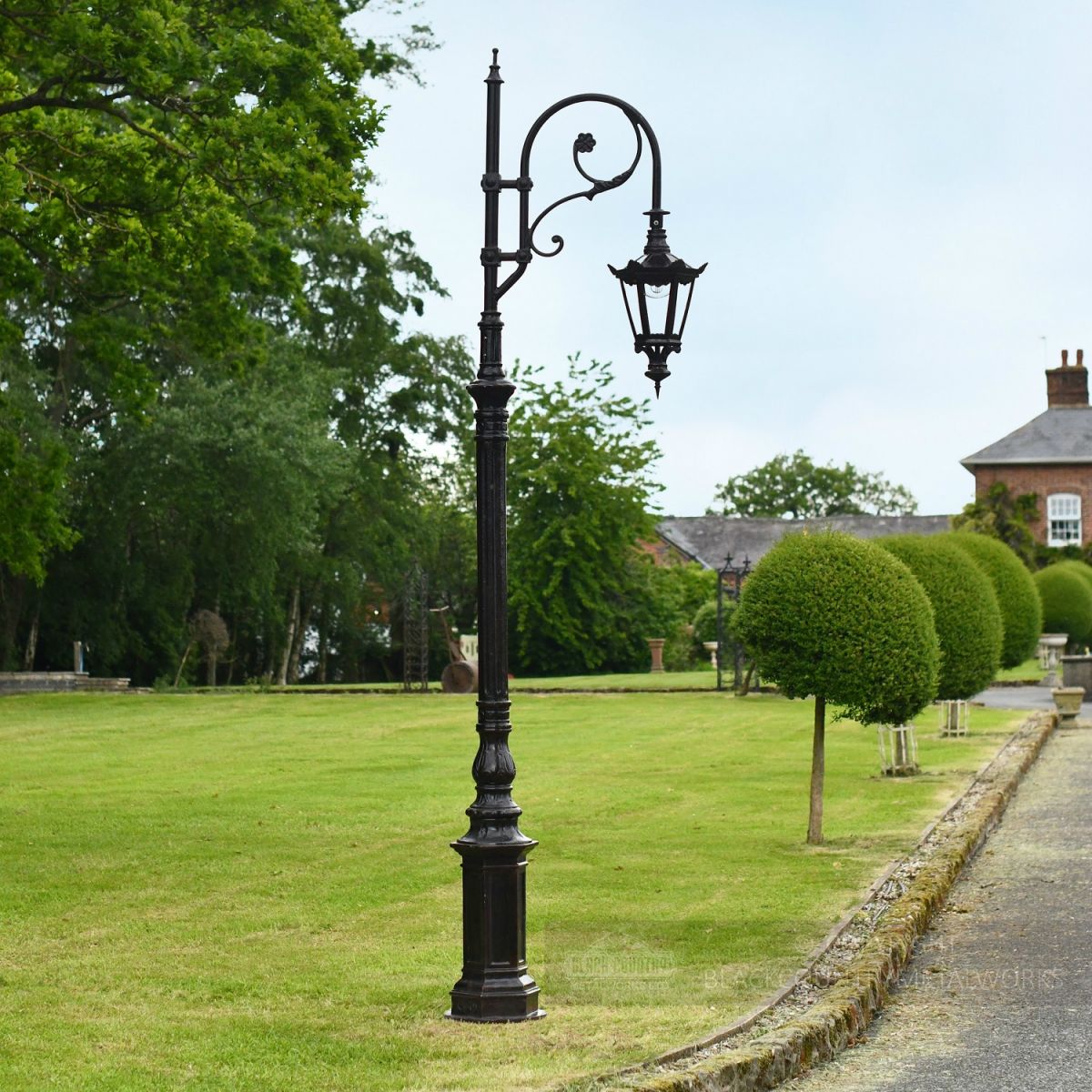 Brown CCast Iron Ornate Swan Neck Lamp Post On Driveway Brown CCast Iron Ornate Swan Neck Lamp Post On Driveway