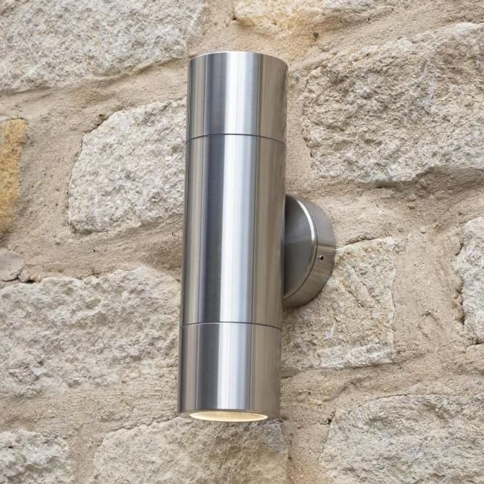 Brushed Aluminium Spotlight Cylinder Wall Light in Situ on a Stone Wall