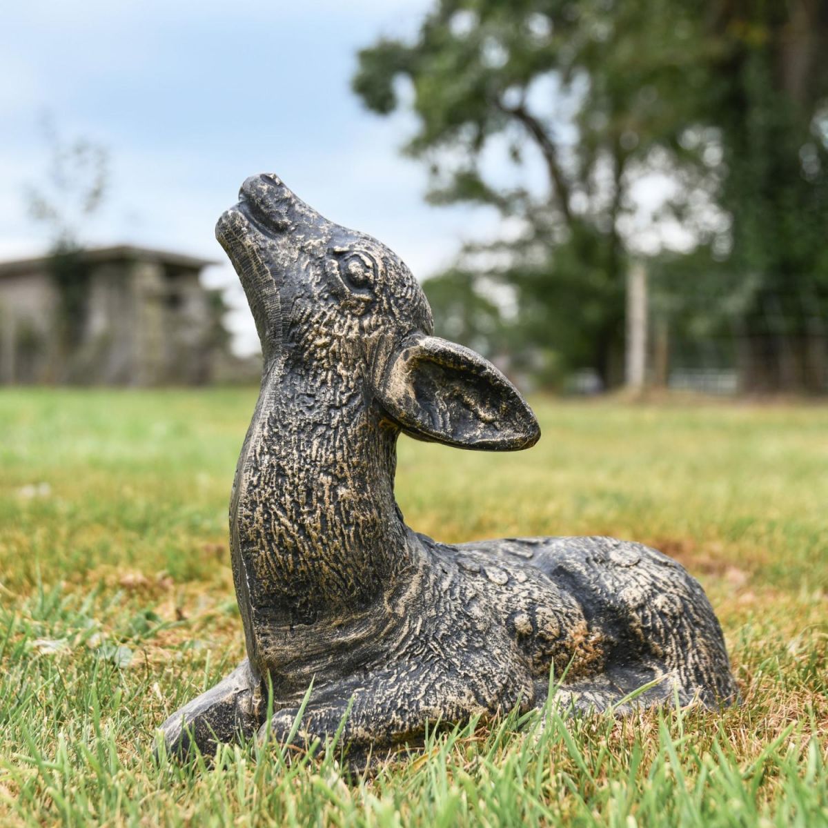 Brushed Gold Recycled Cast Aluminium Baby Deer Sculpture - Lying Down in Situ