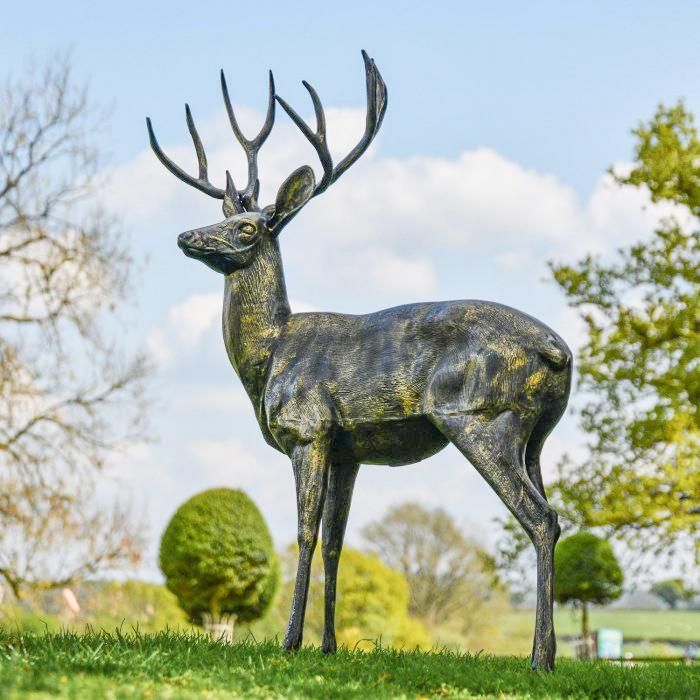 Brushed Gold Standing Deer Sculpture in Garden Setting 
