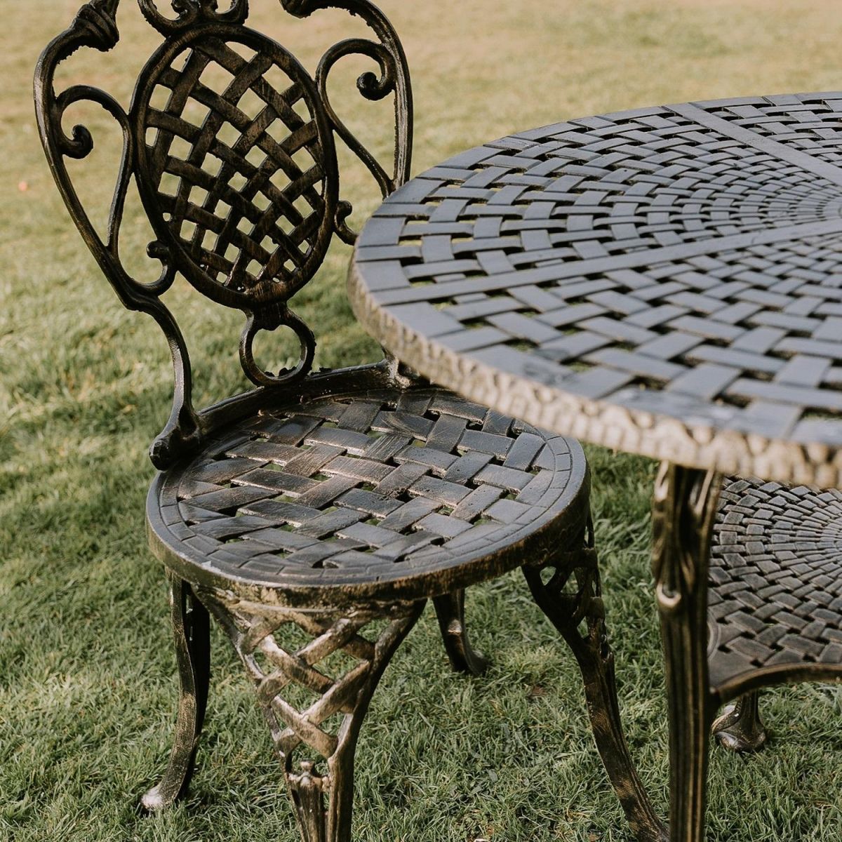 Close up of Lattice Design on Brushed Gold "Wentworth" Dining Set 