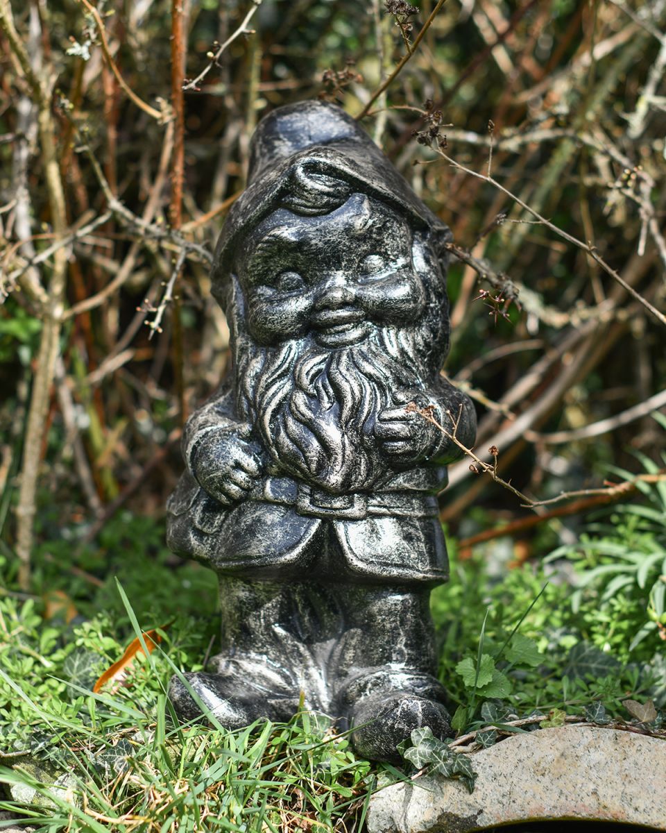 Brushed Silver Gnome Sculpture on Display in the Garden
