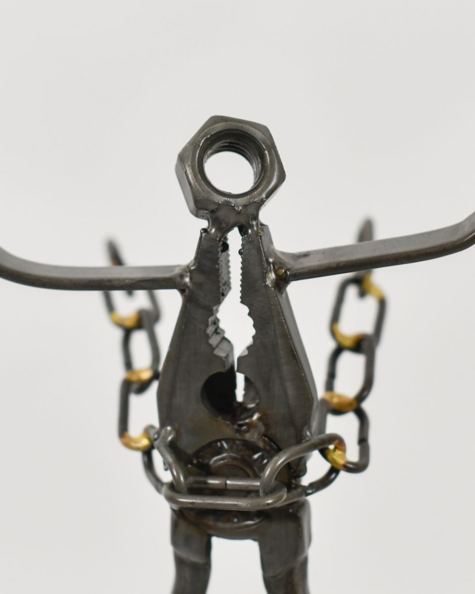 Close up of intricate detail on recycled metal art sculpture Close up of intricate detail on recycled metal art sculpture