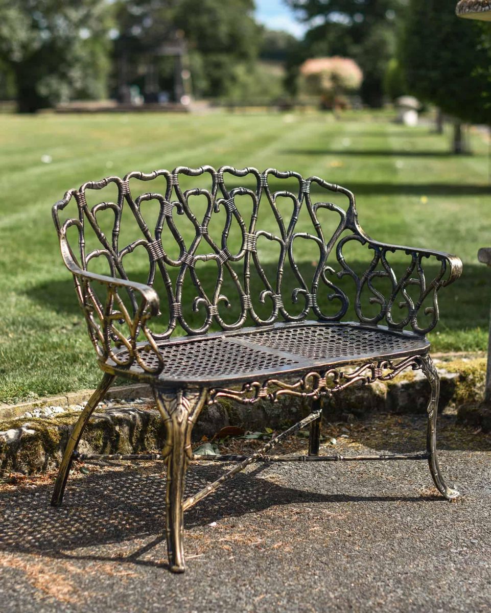 Cast Aluminium "Halter" Two Seater Garden Bench in Situ Cast Aluminium "Halter" Two Seater Garden Bench in Situ