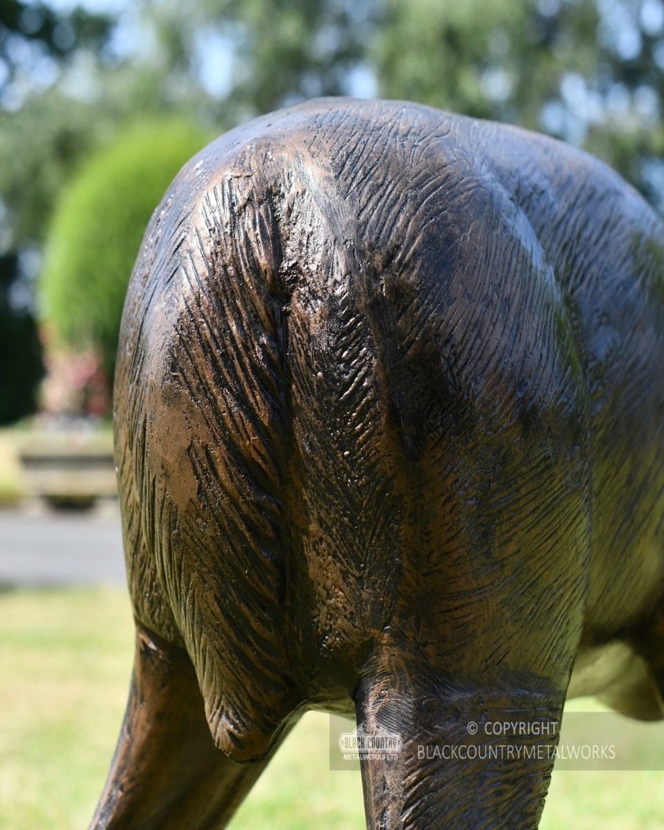 Grazing doe sculpture hind legs 