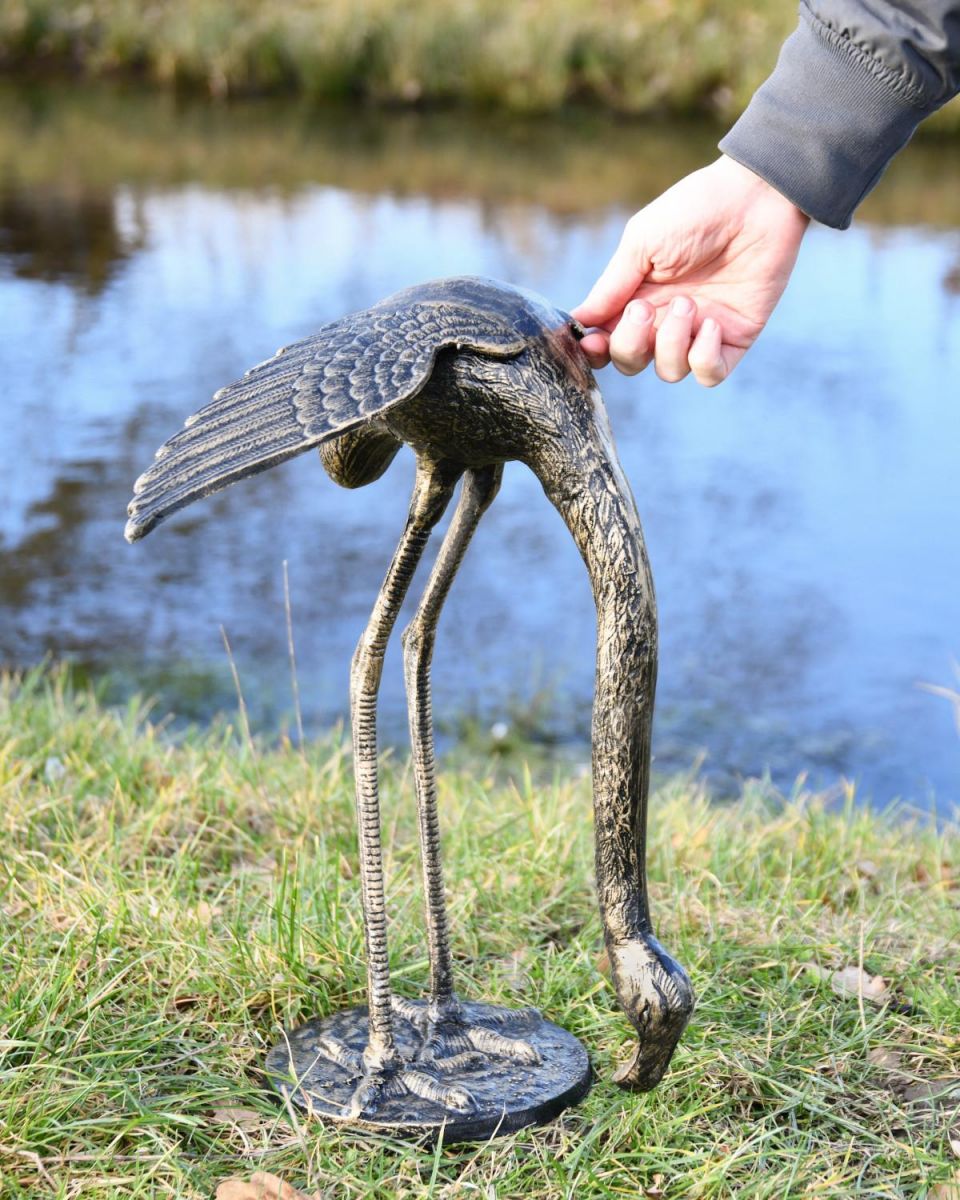 Scale Shot of Cast Aluminium Feeding Flamingo Garden Sculpture - Head Down Scale Shot of Cast Aluminium Feeding Flamingo Garden Sculpture - Head Down