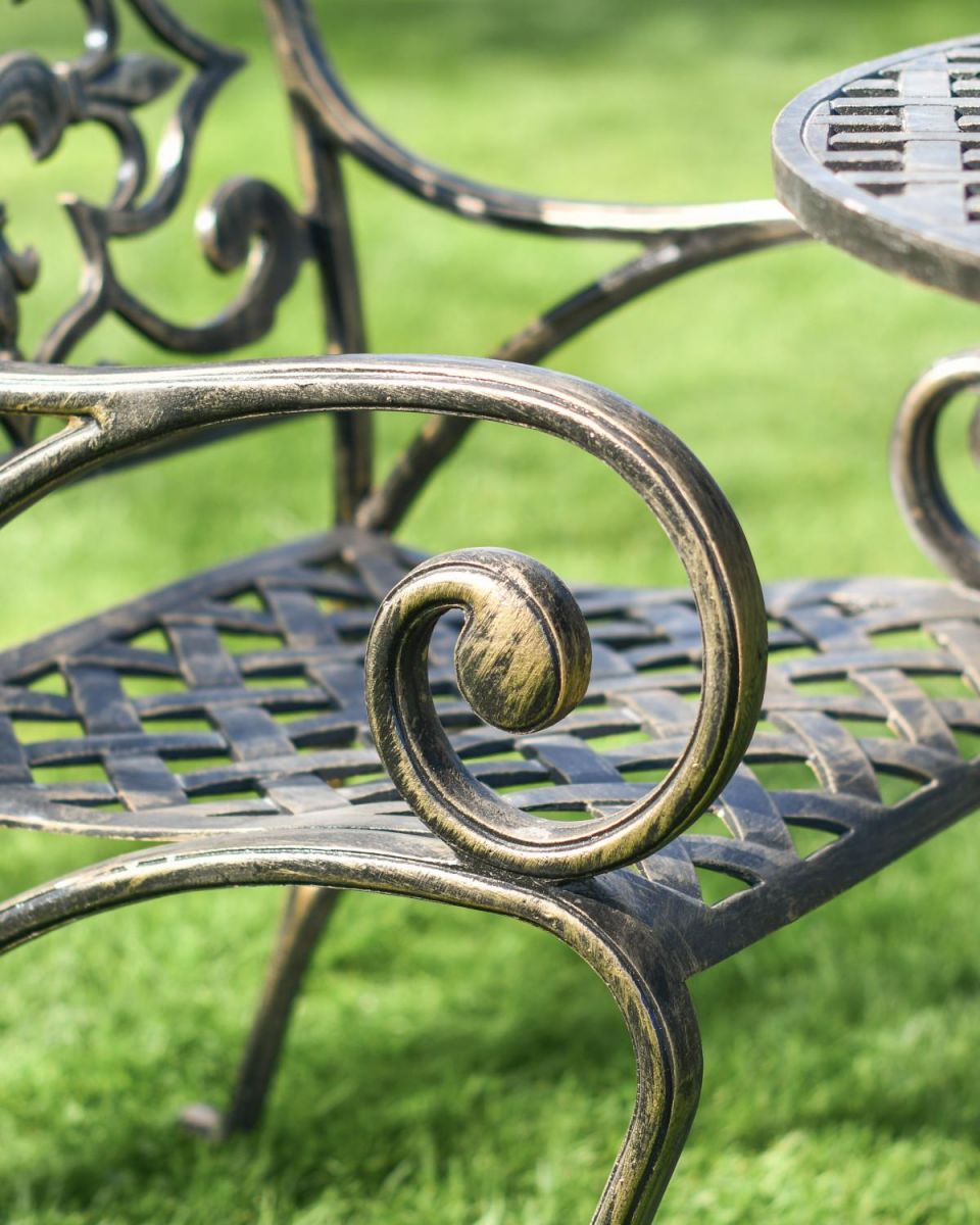 Close-Up of Ornate Armrests on Chairs