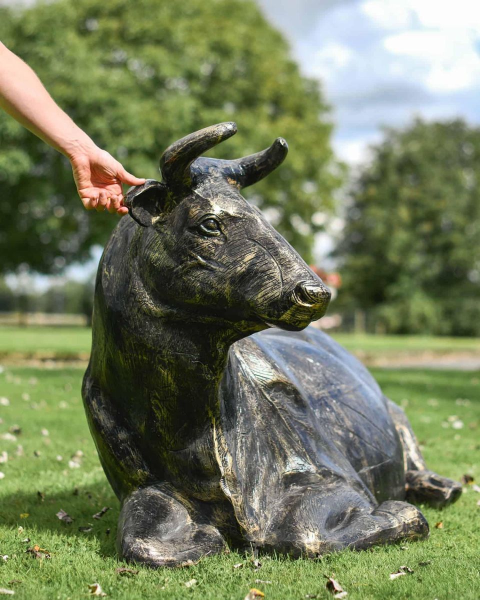 Scale Shot of Cast Aluminium Laying Cow Sculpture