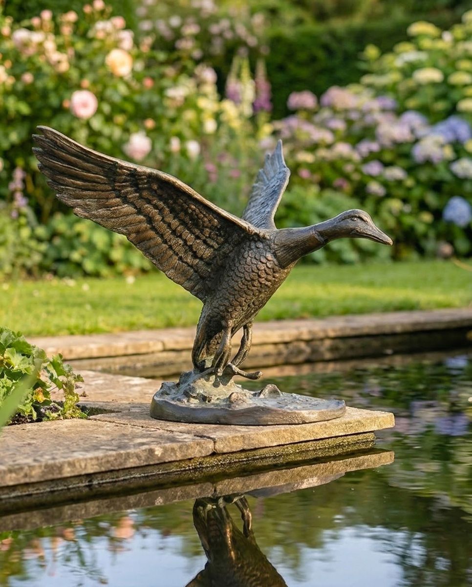 Cast Aluminum "Volans" Flying Duck Garden Sculpture ai illustration