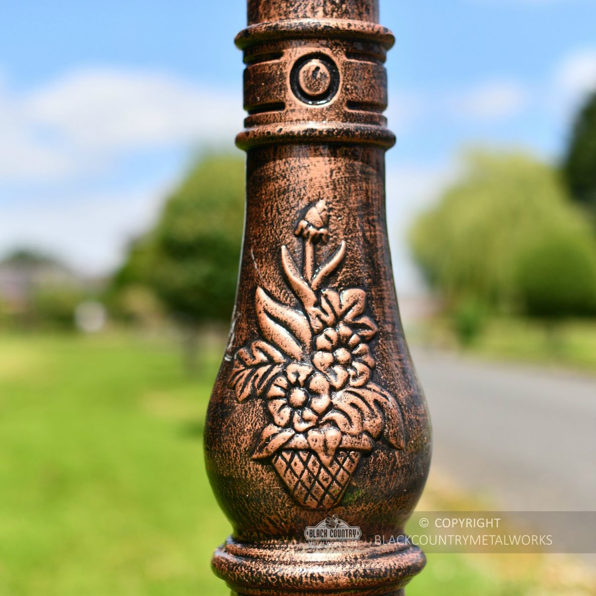 Cast Decoration On Victorian Lamp Post With Antique Copper Finish