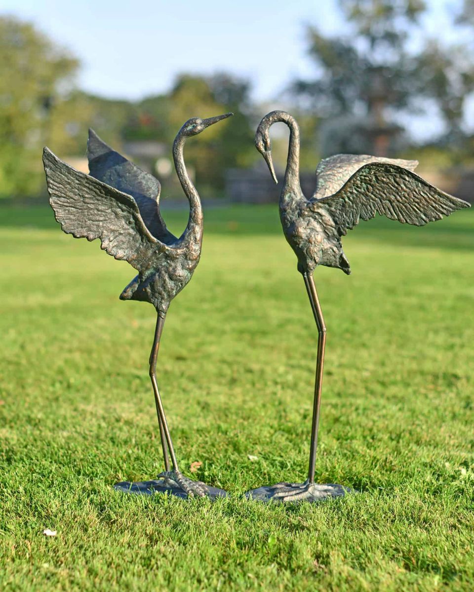 Cast Iron Freestanding "Fighting Flamingos" Garden Sculpture - Set of Two in Situ
