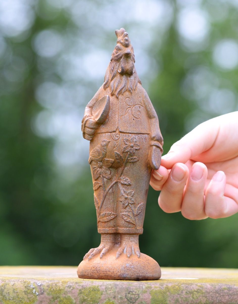 Scale of Cast Iron Gardening Rooster Sculpture