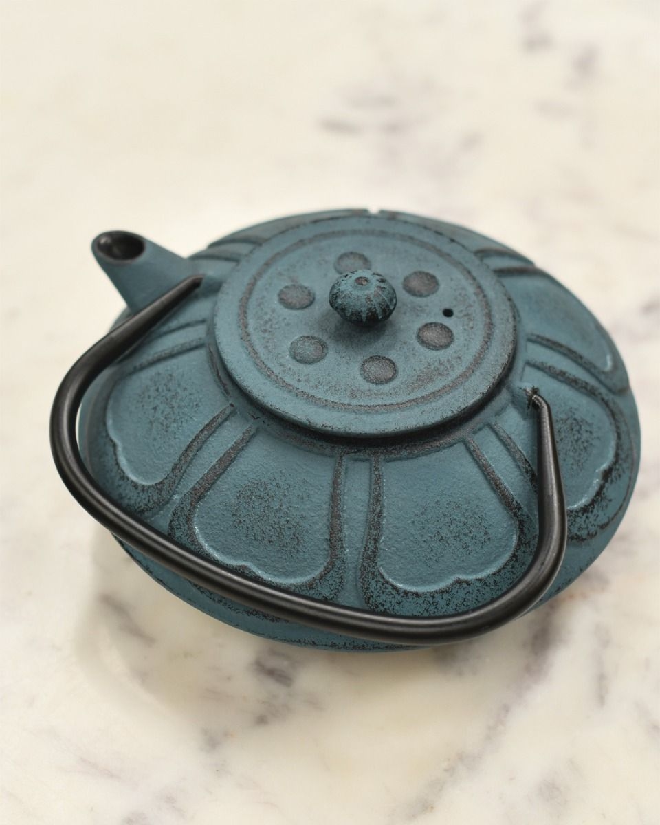 Cast Iron Teal Japanese Style Teapot With Lid On 