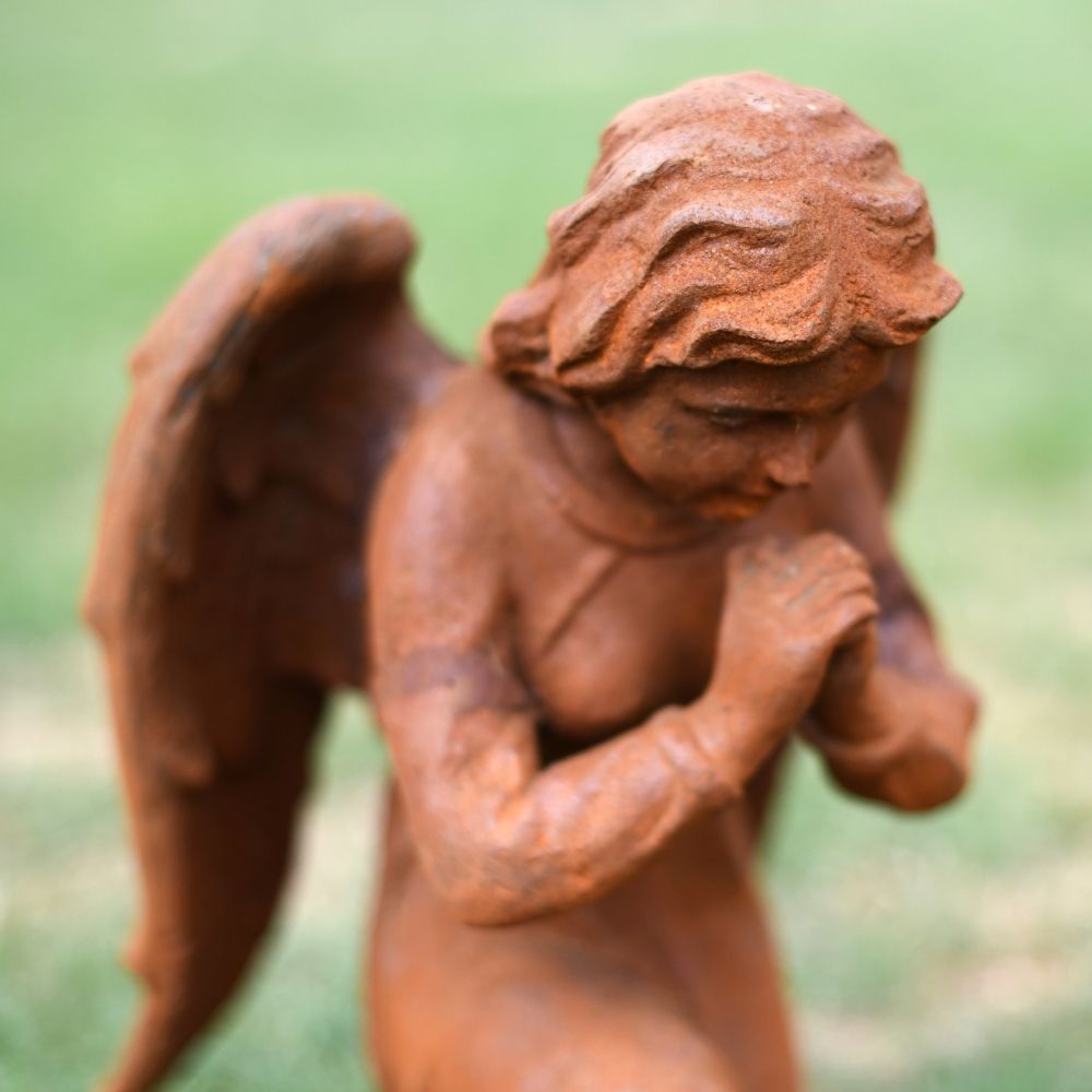 Cast Iron Praying Angel Sculpture - Close up Cast Iron Praying Angel Sculpture - Close up