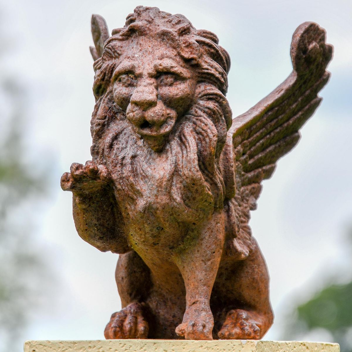 Cast Iron Winged Lion Sculpture in Use Outdoors