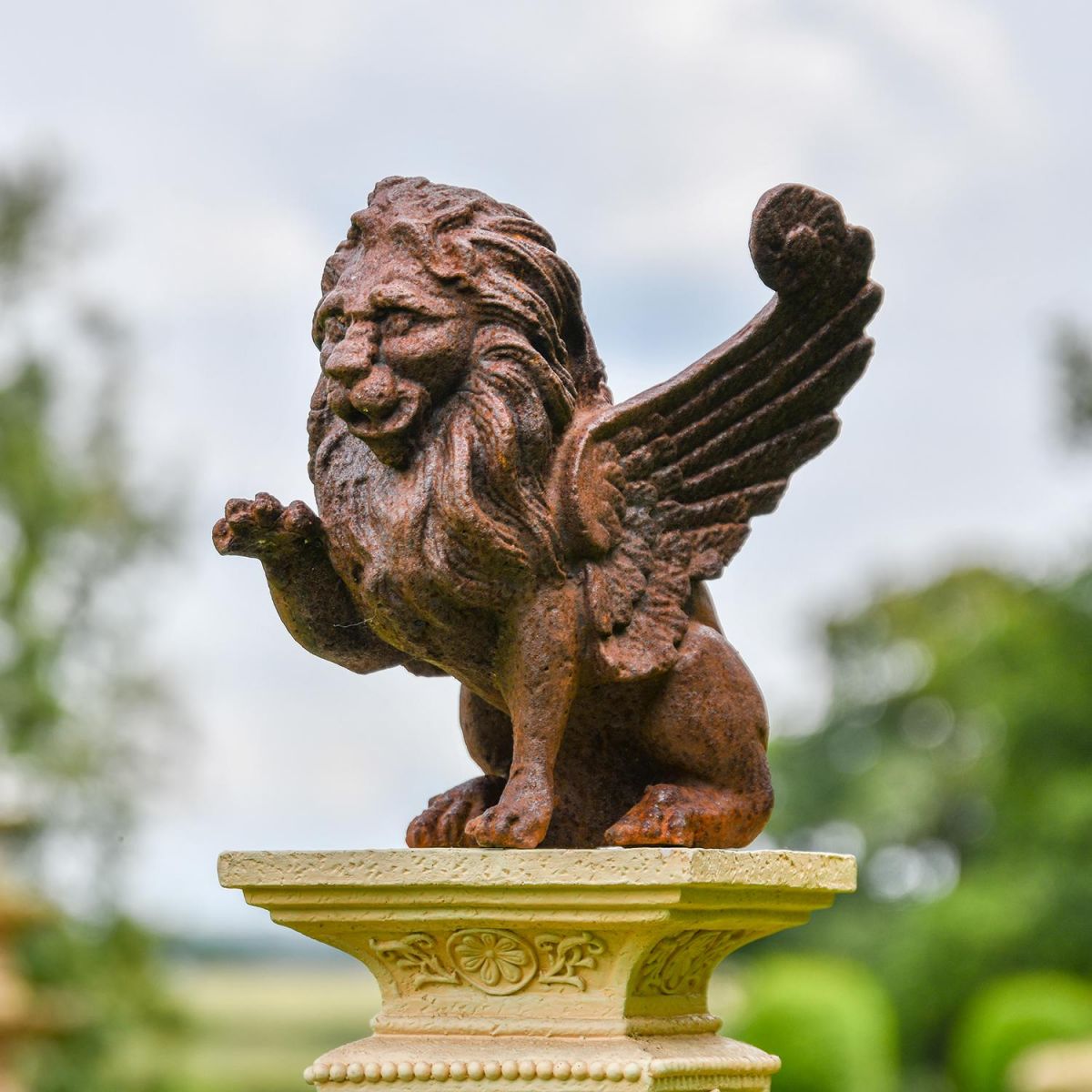 View From the Side of the Cast Iron Winged Lion Sculpture