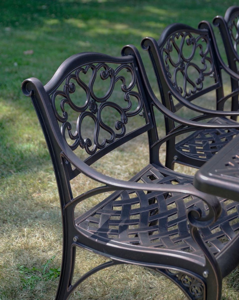 The "Verona " 8-Seater Luxury Garden Dining Set - Antique Copper Seat Close Up No Cushions. Shot In A Garden