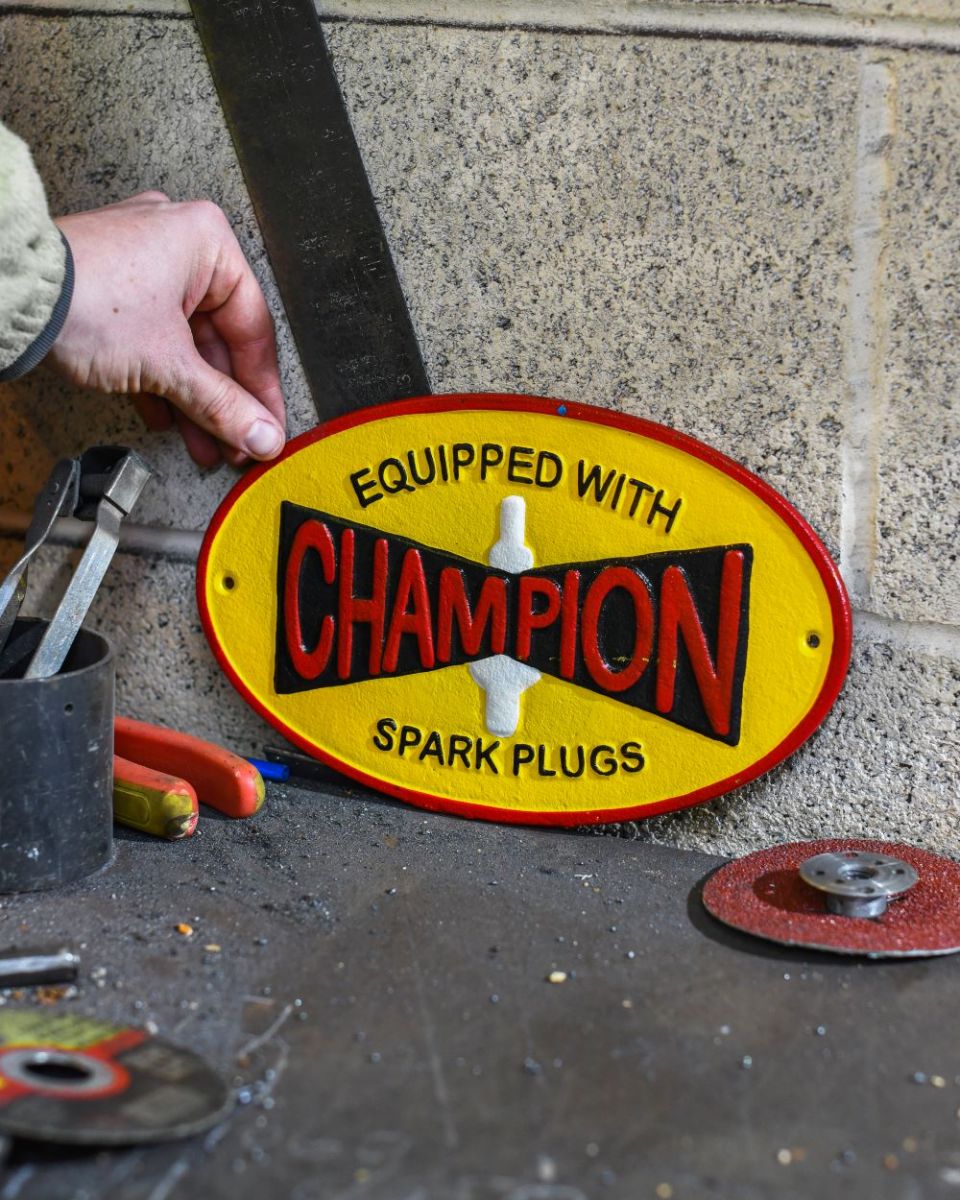 Scale image of "Champion" Cast Iron Automobilia Reproduction Sign  Scale image of "Champion" Cast Iron Automobilia Reproduction Sign
