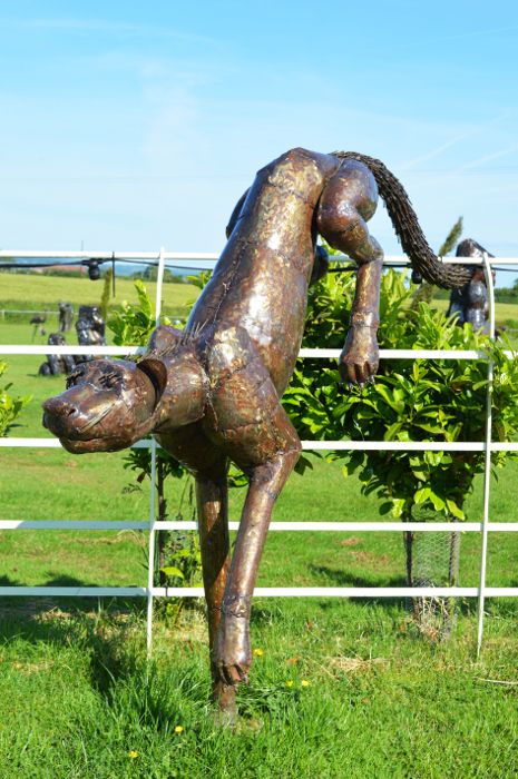 "Dumana Plains" Wrought Iron Cheetah Sculpture "Dumana Plains" Wrought Iron Cheetah Sculpture