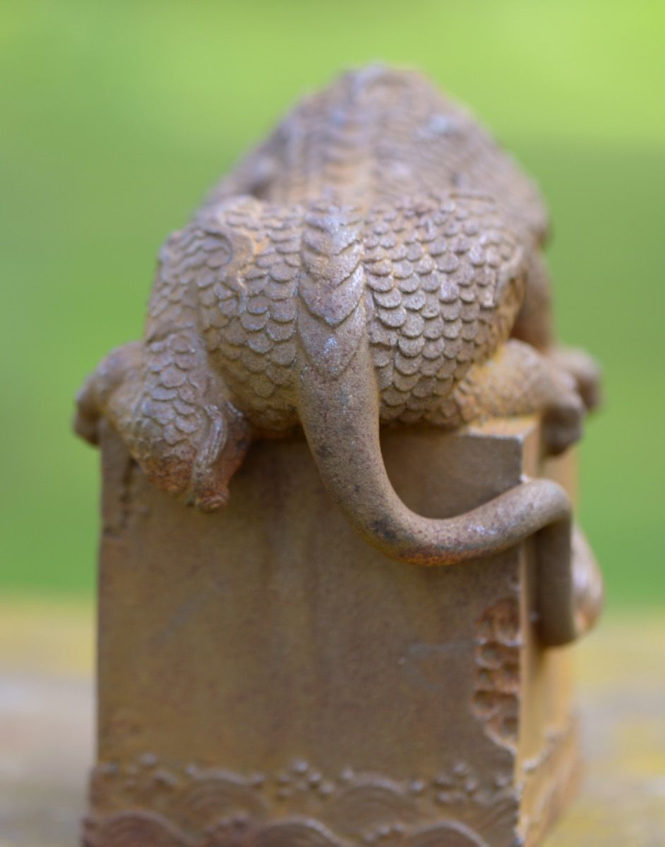 Back of Cast Iron Curious Dragon Sculpture