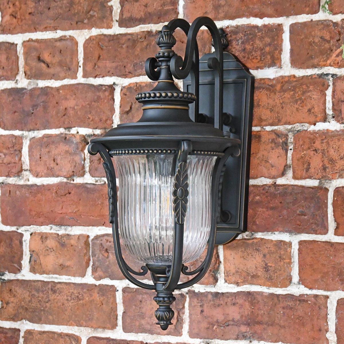 "Christleton" Bronze Wall Light on Brick Wall