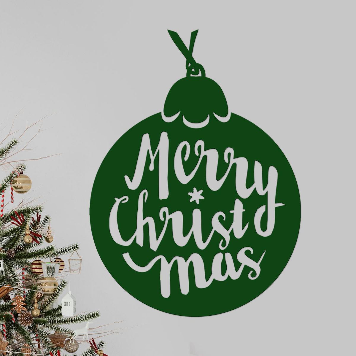 Green Christmas Bauble Steel Wall Art in Situ Next to a Christmas Tree