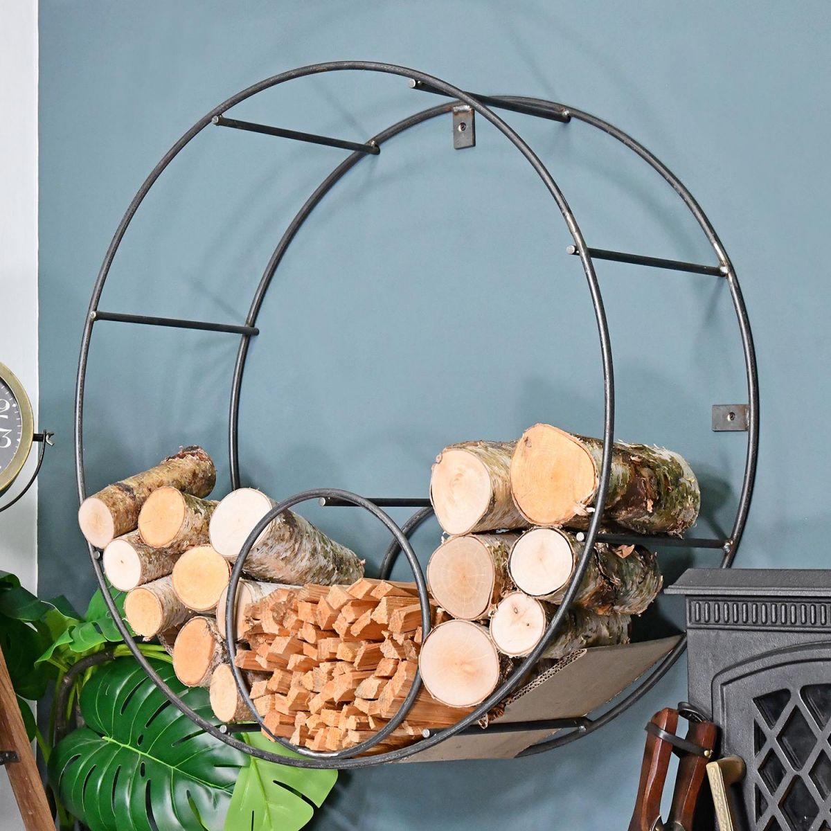Circular Iron Wall Mounted Log Holder in Situ in the Home