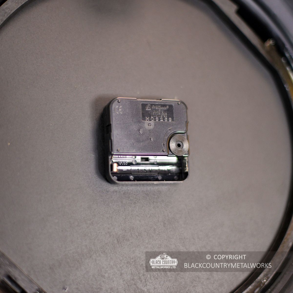 Close-up of the Battery Holder on the Back of the Clock Close-up of the Battery Holder on the Back of the Clock