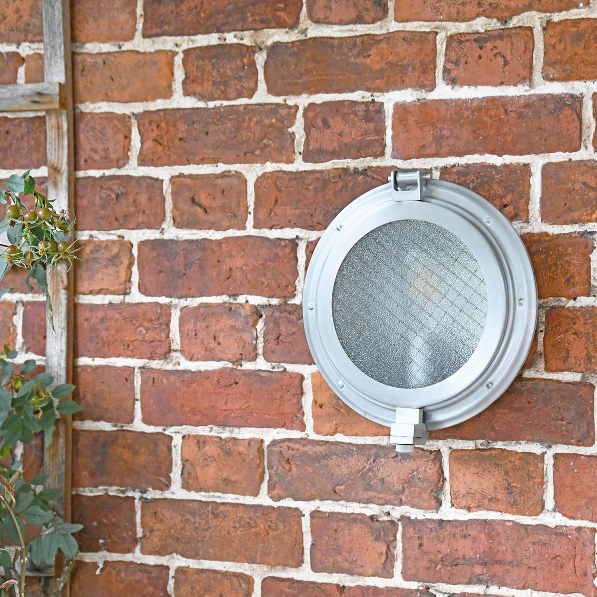 Classic Bulk Head Style Wall Mounted Light in Situ on a Brick Wall