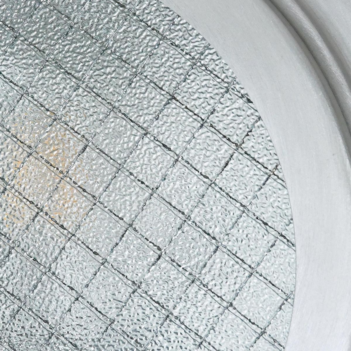 Close-up of the Porthole Style Glass in the Wall Light