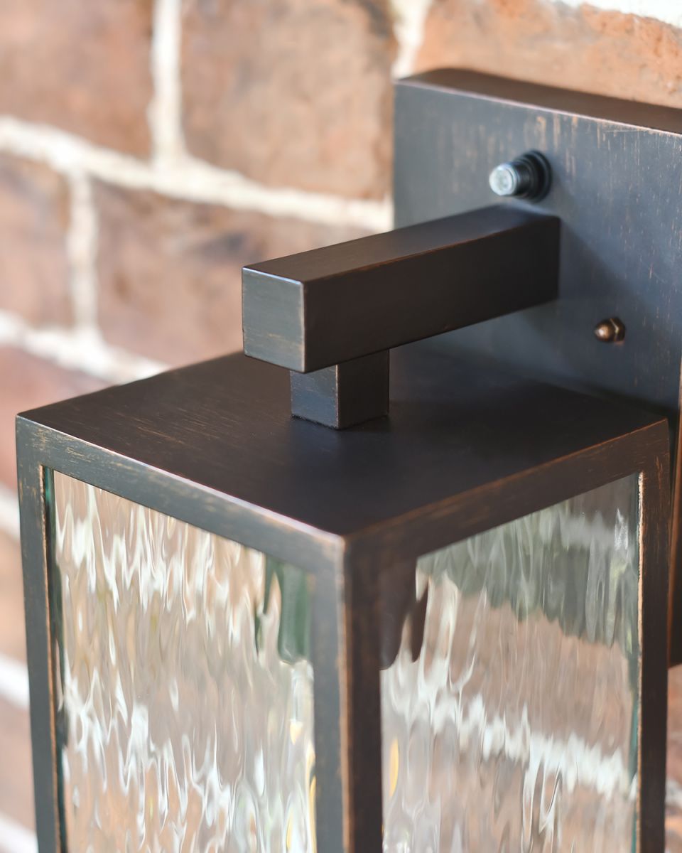 Close-up of the Bracket on the Top of the Wall Light Close-up of the Bracket on the Top of the Wall Light