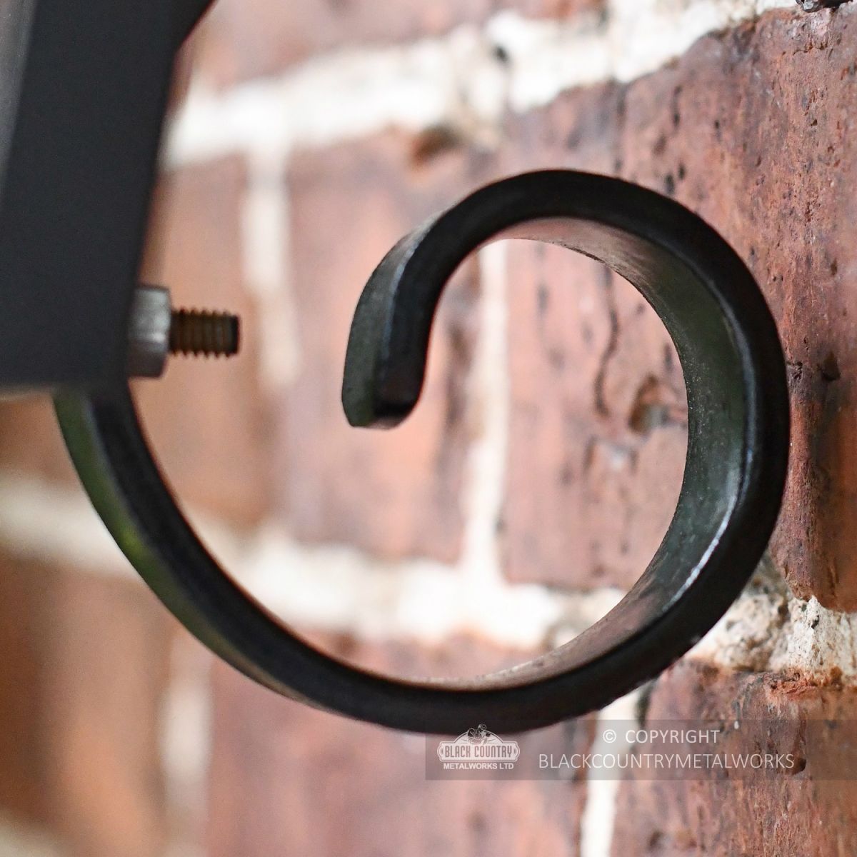 Close Of Scrolled Lantern Bracket