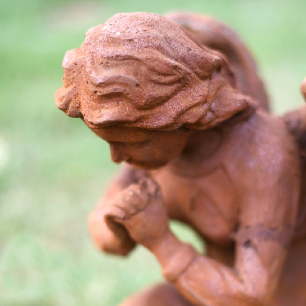 Close of the Detail of the Rustic Angel Statue Close of the Detail of the Rustic Angel Statue