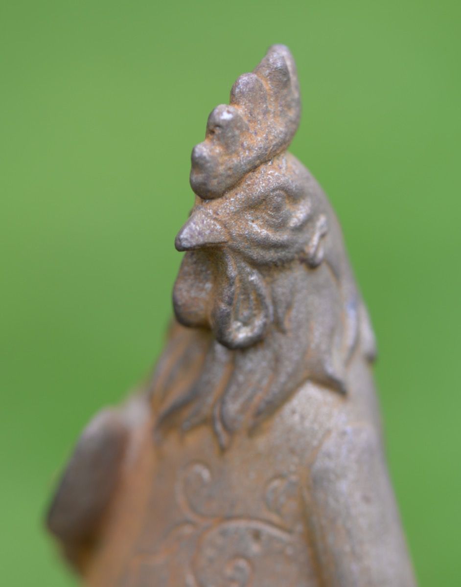 Close-Up of Cast Iron Gardening Rooster Sculpture