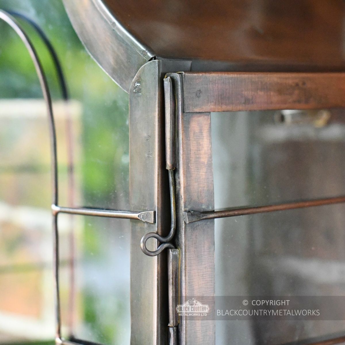 Close Up Copper Finish On Wall Light