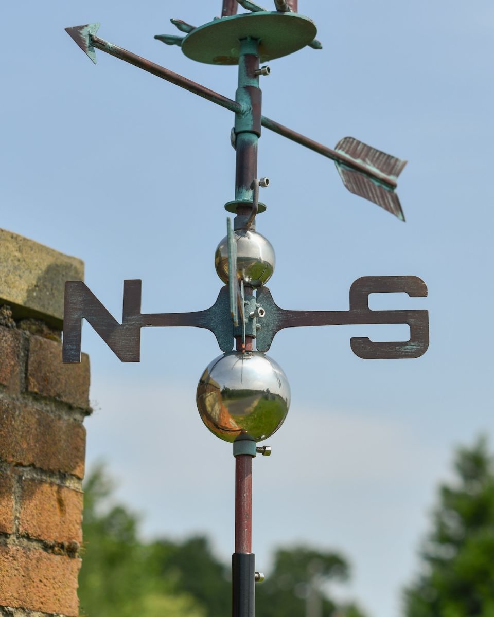 Close up of arrow detail on Verdigris Rooster Weathervane