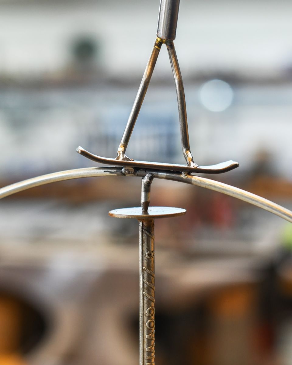 Close up of balancing element on skateboarder sculpture Close up of balancing element on skateboarder sculpture