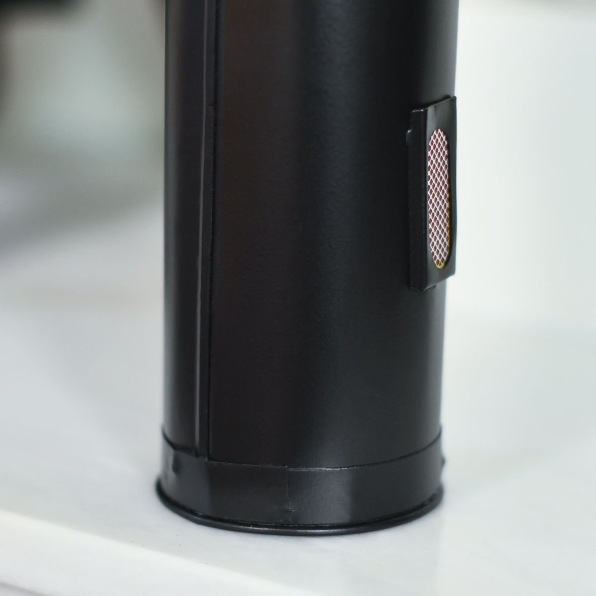 Close up of striker strip on fireside match holder