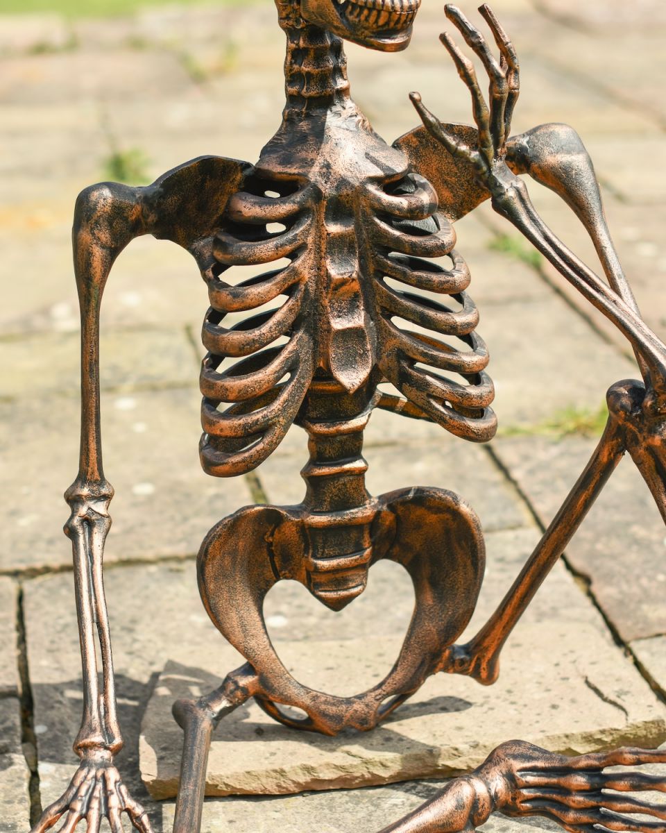Close up of intricate body detail on skeleton outdoor statue